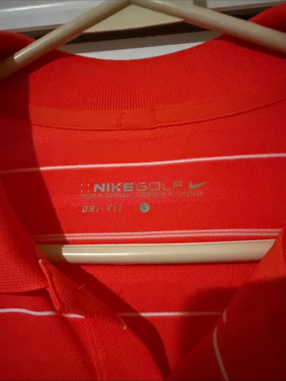 Nike Golf Orange Polo with Thin White Stripes